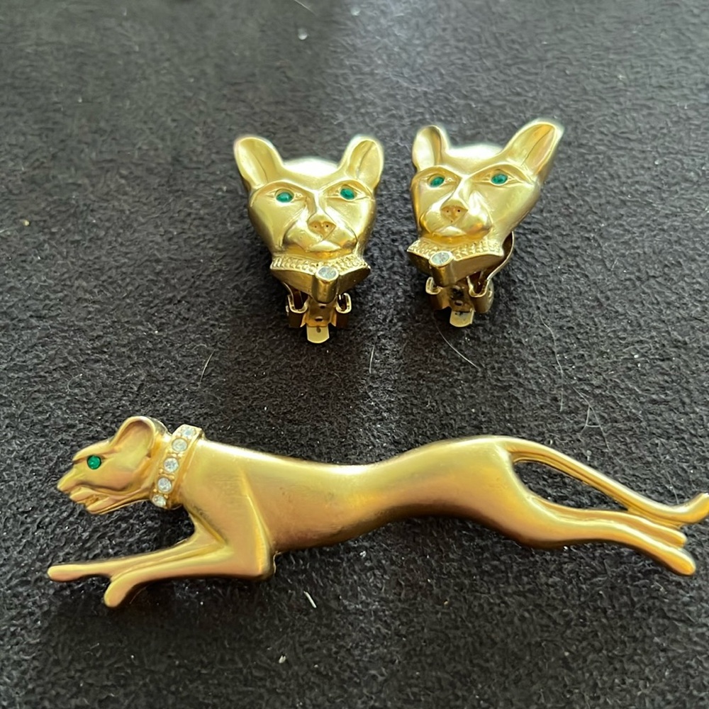 Vintage Jackie Collins pin and clip on earrings